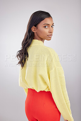 Buy stock photo Serious, stylish and fashion portrait of a woman isolated on a white background in a studio. Indian, young and a model with trendy style, fashionable clothing and a vibrant color outfit on a backdrop