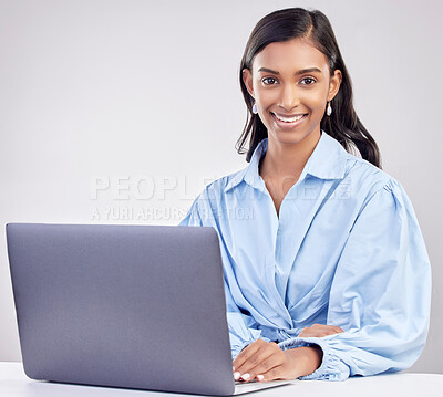 Buy stock photo Laptop, studio and portrait of Indian woman with smile working online for research, internet and website. Technology, communication and female worker on computer typing email on white background