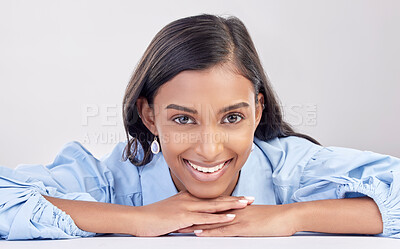 Face, smile and portrait of woman relax feeling happy, confident and excited isolated in a studio white background. Employee, head and Indian female worker proud, happiness and confidence