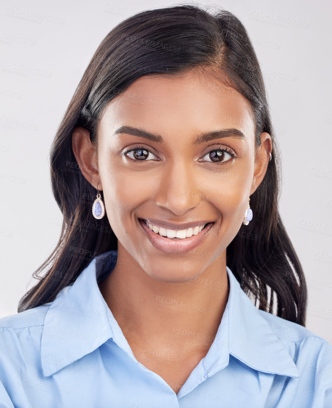 Buy stock photo Face, happy and portrait of Indian woman relax feeling confident, smile and closeup isolated in a studio white background. Employee, head and female worker proud, happiness and confidence