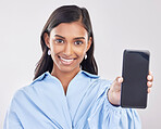 Phone, studio and portrait of Indian woman with smile for advertising, promotion and mockup screen. White background, happy and face of girl with smartphone for social media, website and mobile app