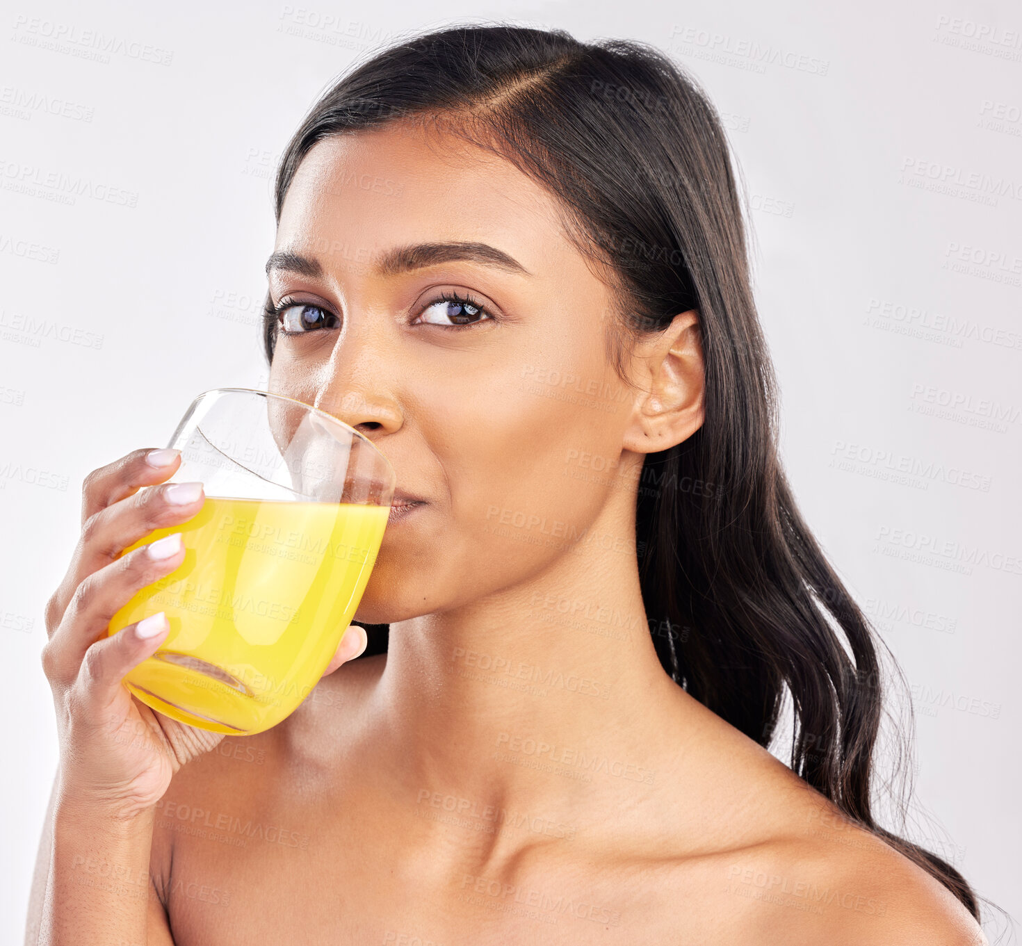 Buy stock photo Woman, drinking juice and health with nutrition and portrait, healthy drink and diet on studio background. Weight loss, organic and freshly squeezed beverage with female, wellness and lifestyle