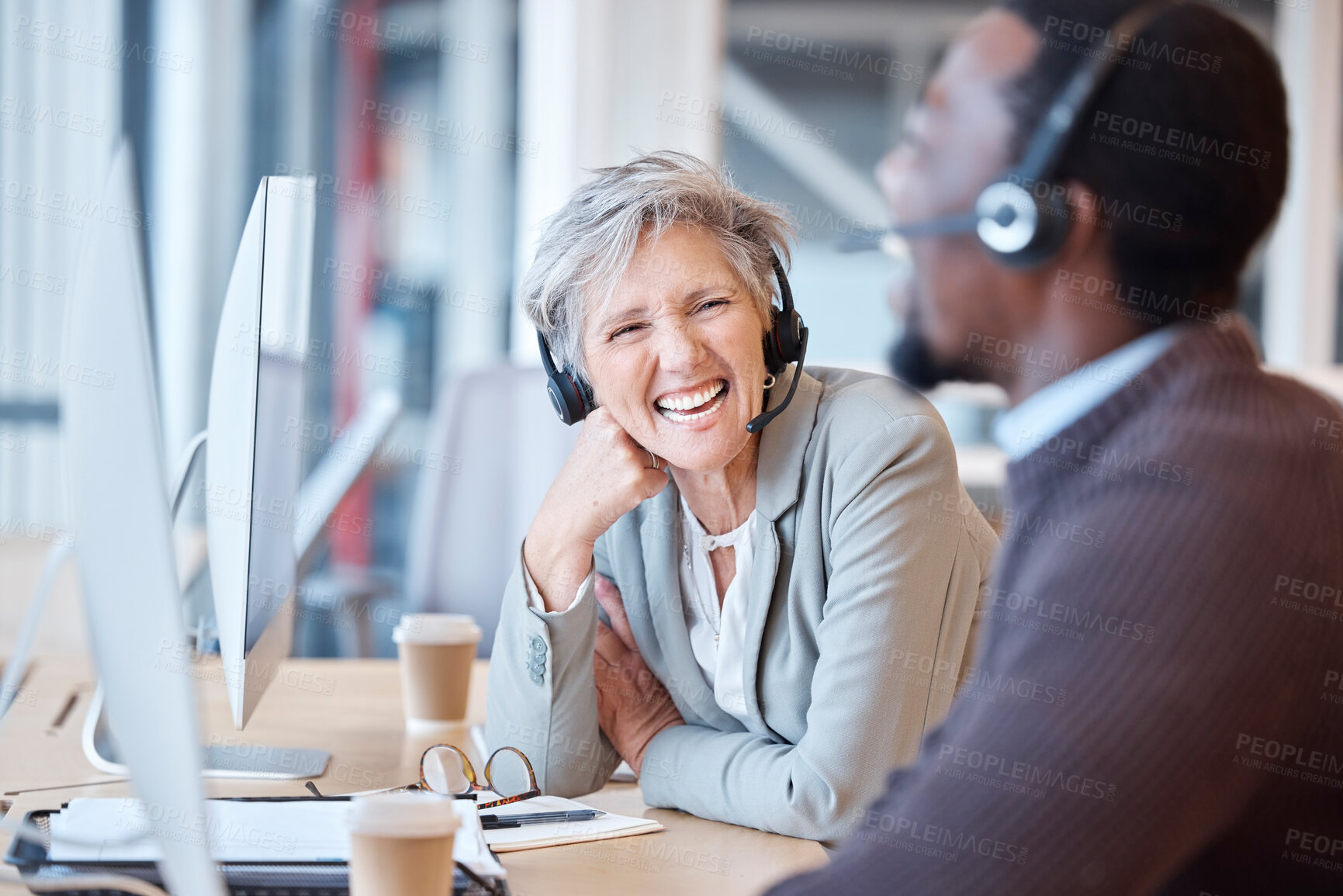 Buy stock photo Call center, laughing and happy people in office for working, customer support or consulting. Telemarketing, contact us and senior woman, friends and black man laugh at funny joke, comedy and humor.