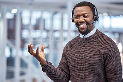 Buy stock photo Call Center or black man consultant with empty hand marketing a product, brand and advertising in an office. Portrait, customer service and employee in mockup space for branding a logo in his palm