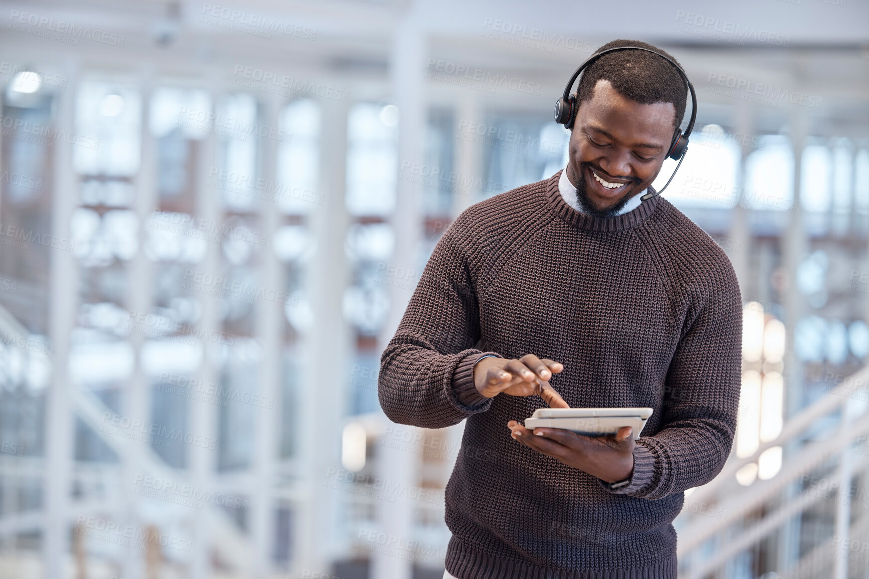 Buy stock photo Call center, tablet and happy black man in office for working, customer support or consulting. Telemarketing, contact us and technology of African person, sales agent or consultant online for service
