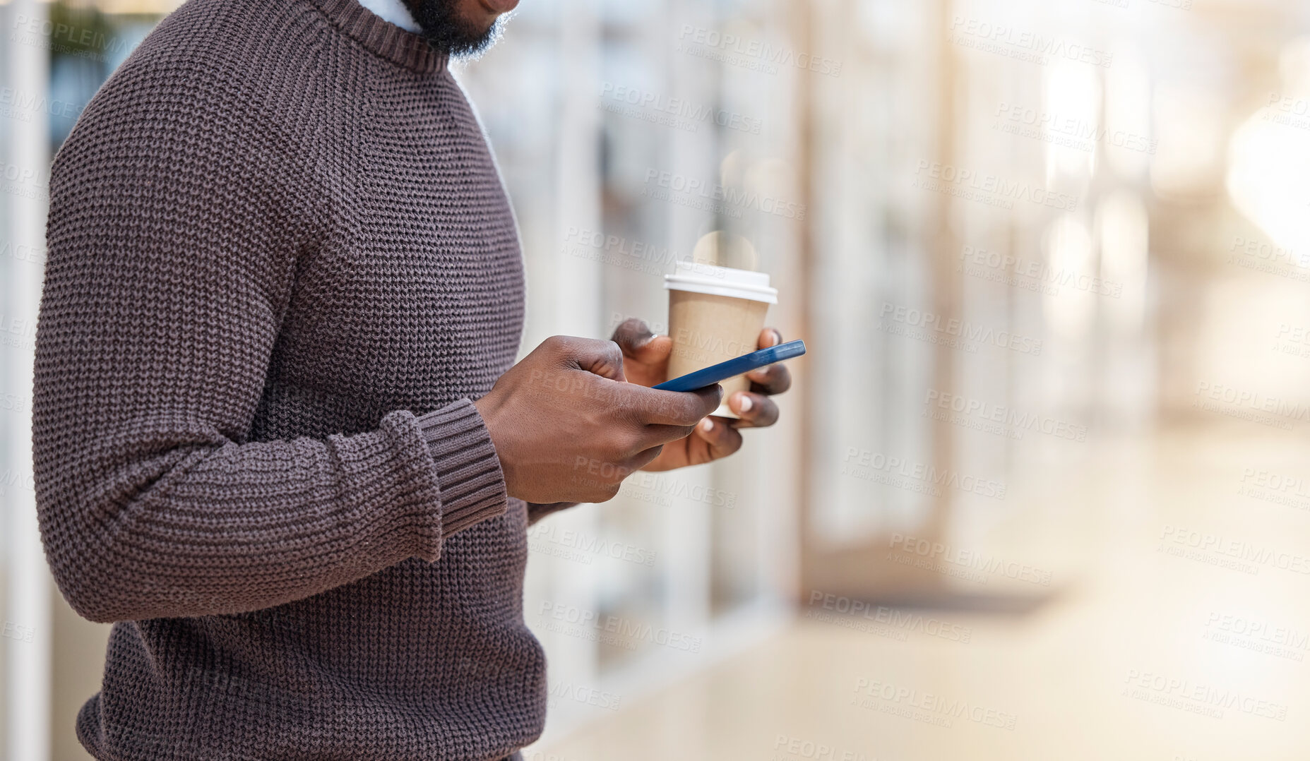 Buy stock photo Hands, coffee and texting with phone in office, social media or typing in workplace mockup. Cellphone, tea and black man or business person browsing online, networking or internet messaging on break.