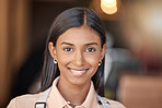 Happy, smile and portrait of an Indian employee at work for corporate happiness and business. Young girl, headshot and a worker smiling with confidence in professional career, work and management