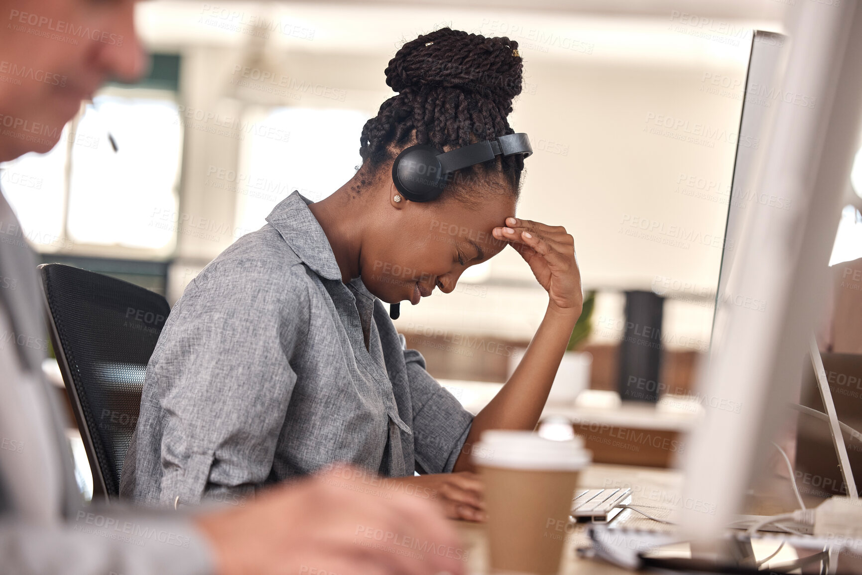 Buy stock photo Call center, woman and stress or headache at computer in office and tired of sales or customer service. African female agent or consultant in telemarketing, support and crm with mental health burnout