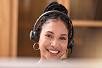 Woman, portrait smile and face in call center with headphones for customer service, support or telemarketing at the office. Happy female consultant or agent smiling with headset for online advice