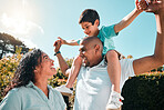 Child, father and mother outdoor as family together in backyard with a smile, love and care. Man, woman and boy kid with parents for security and quality time with happiness and support at park