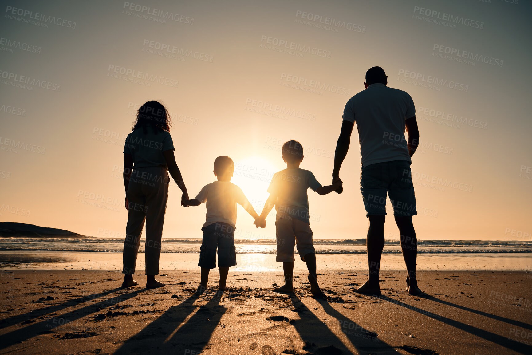 Buy stock photo Family silhouette at the beach, holding hands at sunrise and people with love, care and support outdoor. Mom, dad and kids travel, back and ocean view with parents and children outdoor in nature