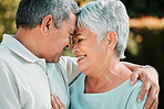 Senior couple, forehead touch and love outdoor in park, garden and nature for hug, care and happiness together. Happy man, woman and retirement with partner, relax and support in marriage for romance