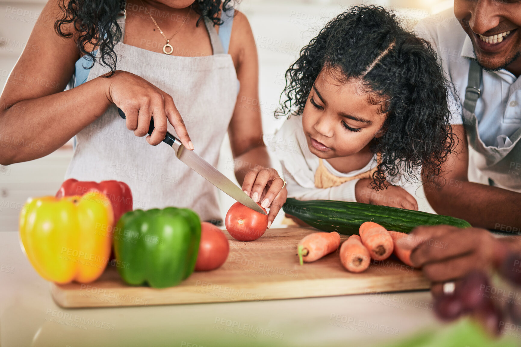 Buy stock photo Family, cutting vegetables and cooking together, learning chef skill with parents and child in kitchen. Nutrition, healthy food and organic with people teaching and learn to cook at home with bonding