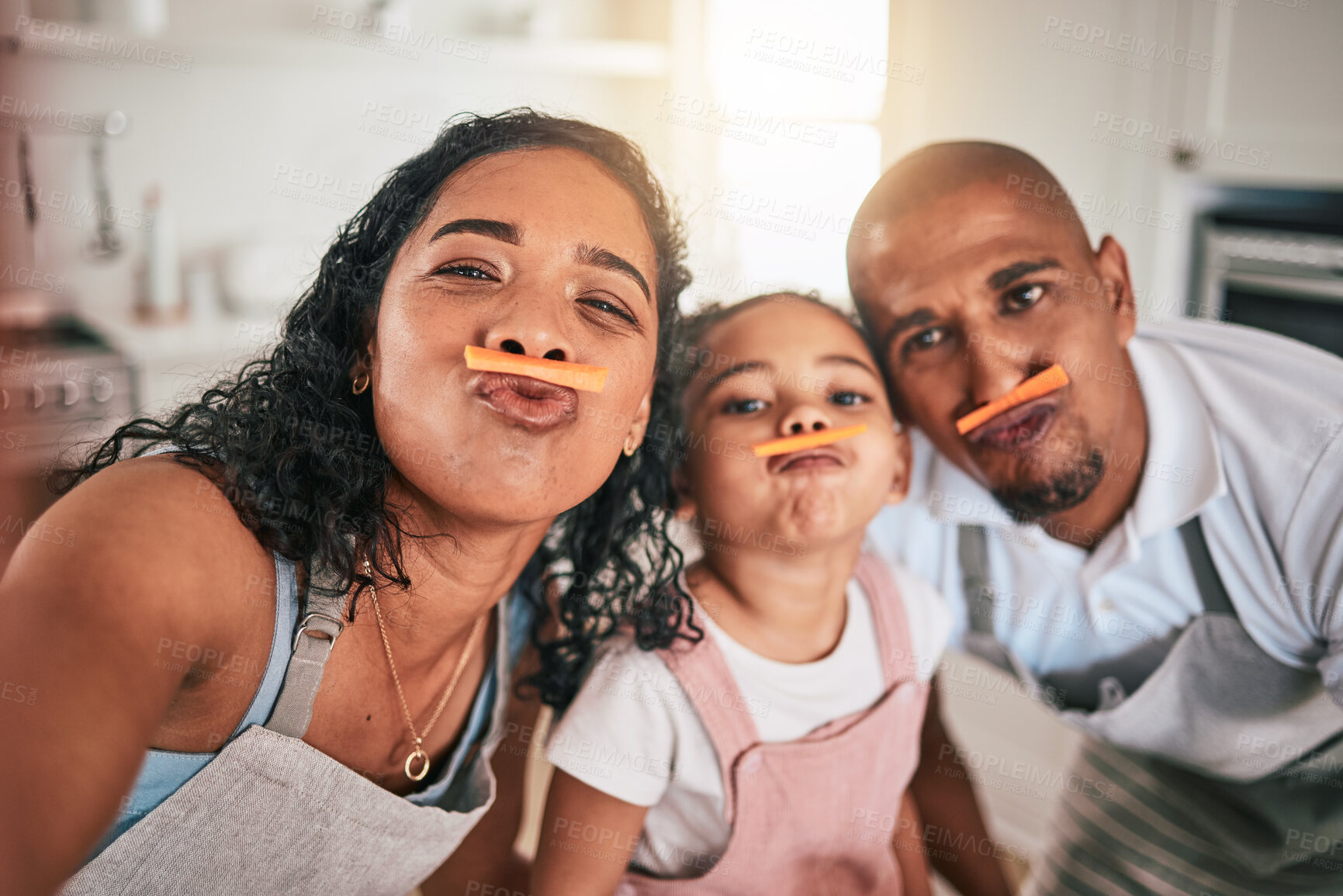 Buy stock photo Selfie, food or portrait of girl and parents in funny face, child development and bonding in kitchen. Family home, cooking fun and silly mom, dad and kid for playful vegetable picture of healthy meal