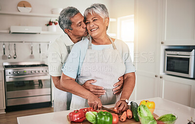 Buy stock photo Cooking vegetables, hug and elderly couple with kitchen ingredients, prepare food or smile on romantic home date. Nutritionist, marriage love and hungry man, woman or people bonding over healthy meal