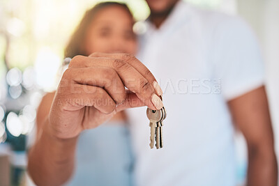 Buy stock photo Keys, home and hands of couple in apartment excited for moving into new house, property and real estate. Homeowners, relationship and happy man and woman with key for mortgage, investment and rent