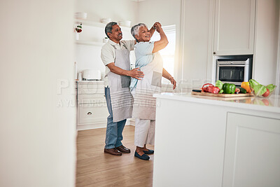 Buy stock photo Happiness, cooking and senior couple dancing in the kitchen together feeling happy, excited and bonding in a home. Care, love and romantic old people or lovers dance enjoying retirement in a house