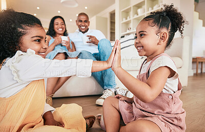 Buy stock photo Family, high five and children playing, smile and having fun in a living room. Kids, hands and games with parents bonding in their home, cheerful and relaxing, smiling and enjoying happy childhood