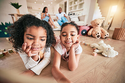 Buy stock photo Kids, sister and best friends on the living room floor together in their home for bonding while having fun. Children, family and smile with happy girls in their house for growth or development