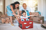 Family, fun and motion blur with a girl in a toy car, being pushed by her mother and father in the living room. Children, excitement or love with a man, woman and daughter playing together at home