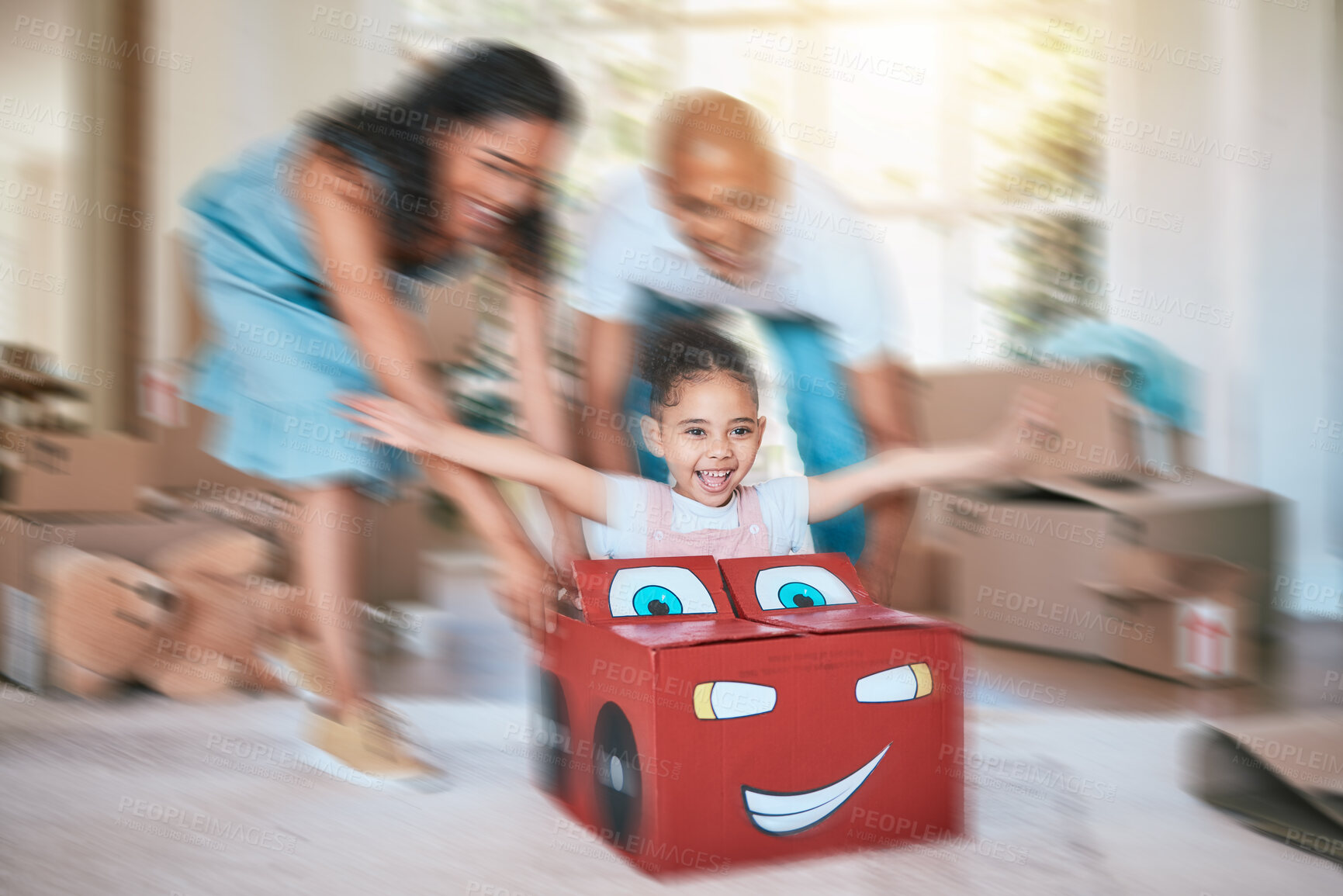 Buy stock photo Family, fun and motion blur with a girl in a toy car, being pushed by her mother and father in the living room. Children, excitement or love with a man, woman and daughter playing together at home