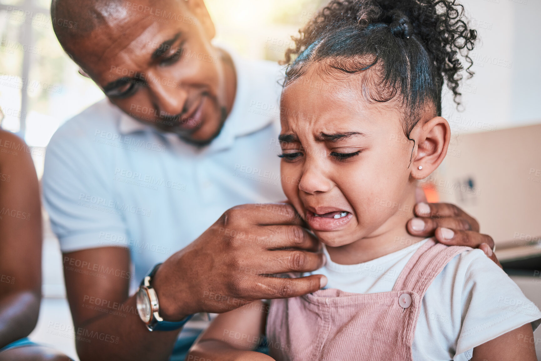 Buy stock photo Crying, child and dad support with love and parent care in a family home with a girl feeling sad. Upset kid, father and youth grief of a young daughter with papa and emotions from worry and stress