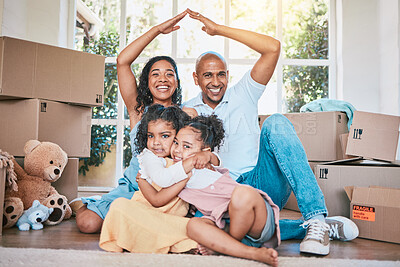 Buy stock photo Roof, new home portrait and happy family hug, moving boxes into real estate property or relocation house. Safety protection, insurance and parents with kids bonding, relax and embrace in apartment