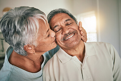 Buy stock photo Love, kiss and elderly face of happy couple romance, spouse support and smile during retirement time together. Happiness, romantic marriage partner and senior woman, old man or people bonding at home