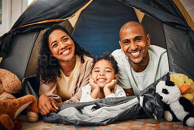 Buy stock photo Parents, girl and portrait in tent at house with toys, games and smile with bonding, love and playing together. Mother, father and kid with camping game in family home with happiness on lounge floor