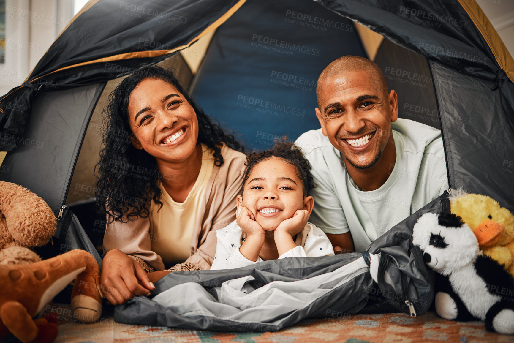 Buy stock photo Parents, girl and portrait in tent at house with toys, games and smile with bonding, love and playing together. Mother, father and kid with camping game in family home with happiness on lounge floor