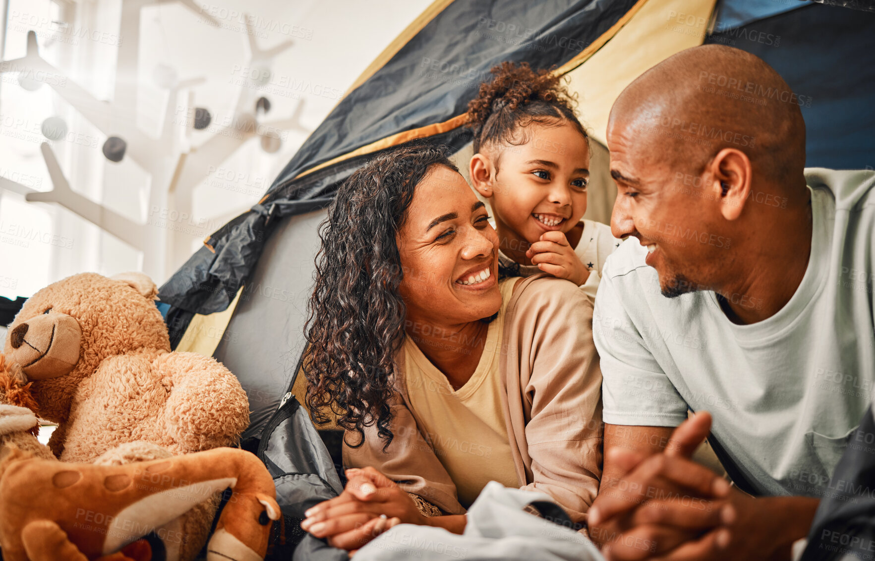 Buy stock photo House camping, playing and happy family bonding, relax and smiling father, mother and daughter enjoy time together. Happiness, youth girl and love of mom, dad or parents with young kid in Mexico home