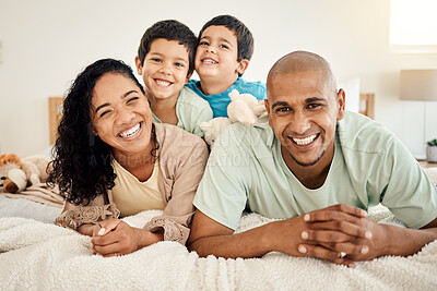 Buy stock photo Family, bed and portrait of parents and kids bonding in a bedroom in a house and playing together. Smile, mother and father happy and excited with children in the morning as love and care