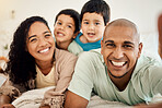 Happy family selfie, bedroom portrait and relax mother, father and children bonding, home and enjoy time together. Happiness, morning love or face of smiling mom, dad and kids on bed for memory photo