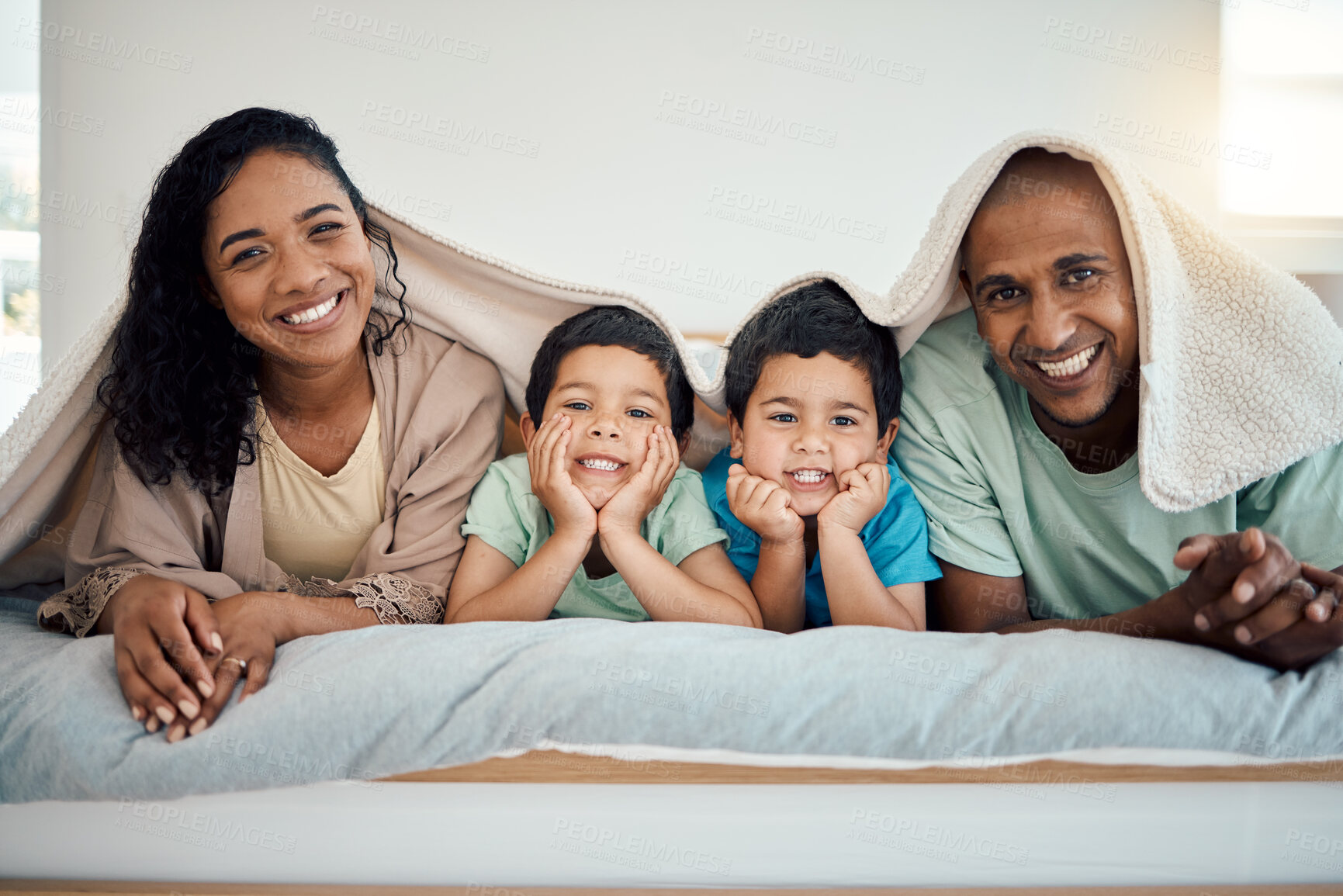 Buy stock photo Happy family, morning bed portrait and relax mother, father and children smiling, home bonding and enjoy time quality together. Comfort, love smile and cozy man, woman and youth kids lying in bedroom