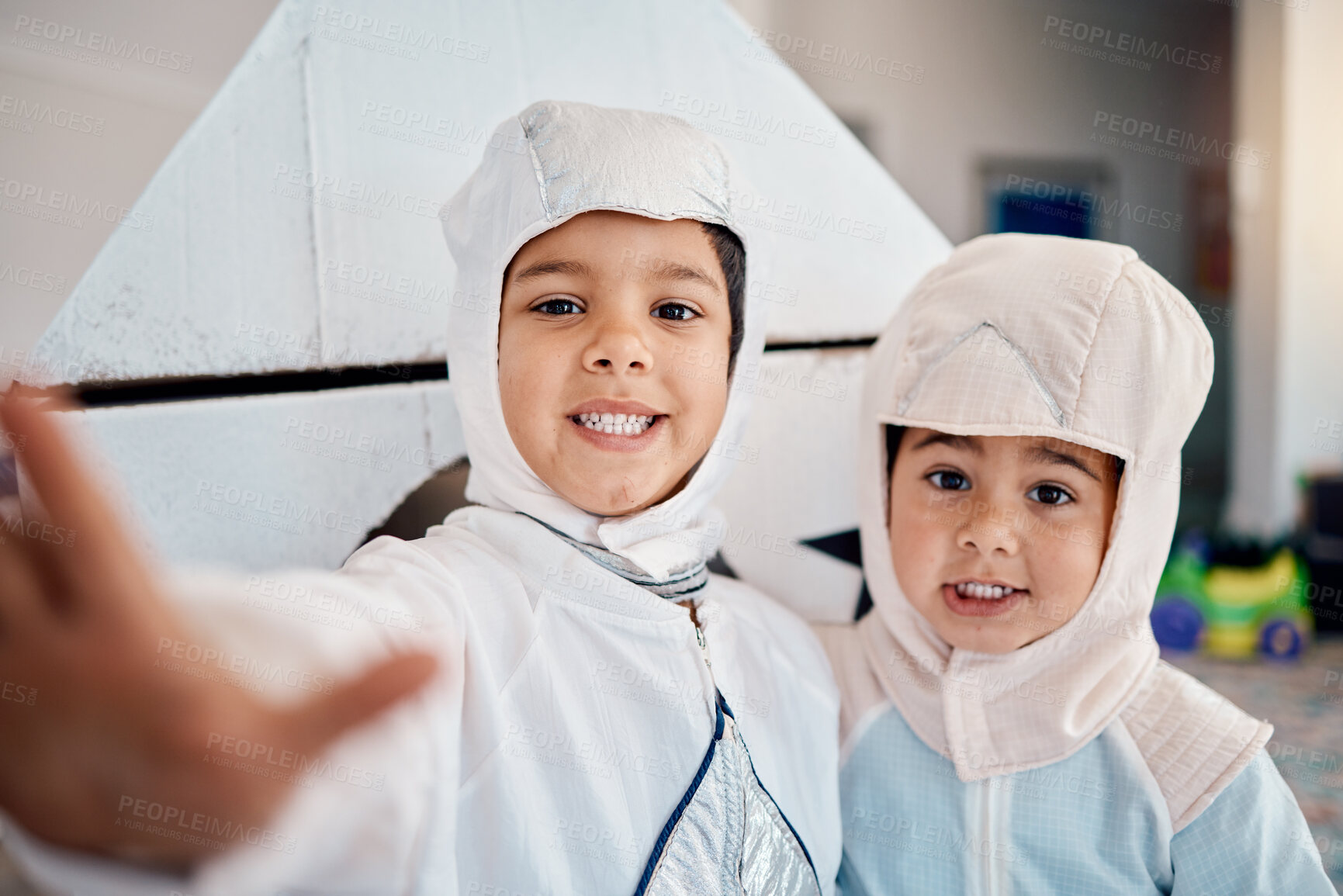 Buy stock photo Selfie, costume and playing with children at home for astronaut, halloween and fantasy. Happy, smile and picture with kids in spacesuit in play room for imagination, photography and siblings