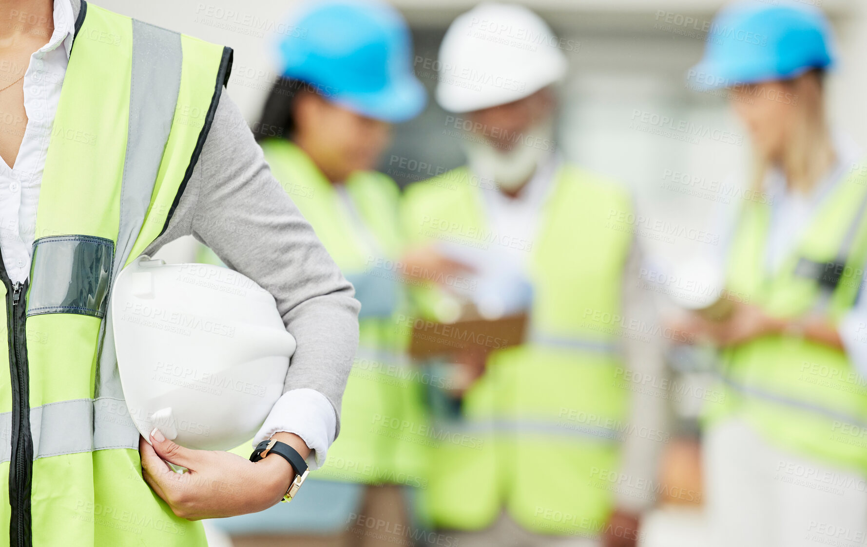 Buy stock photo Industry, hardhat and closeup of a woman construction worker with safety equipment or gear. Builder, professional and zoom of a female industrial foreman worker with her building team on a site.