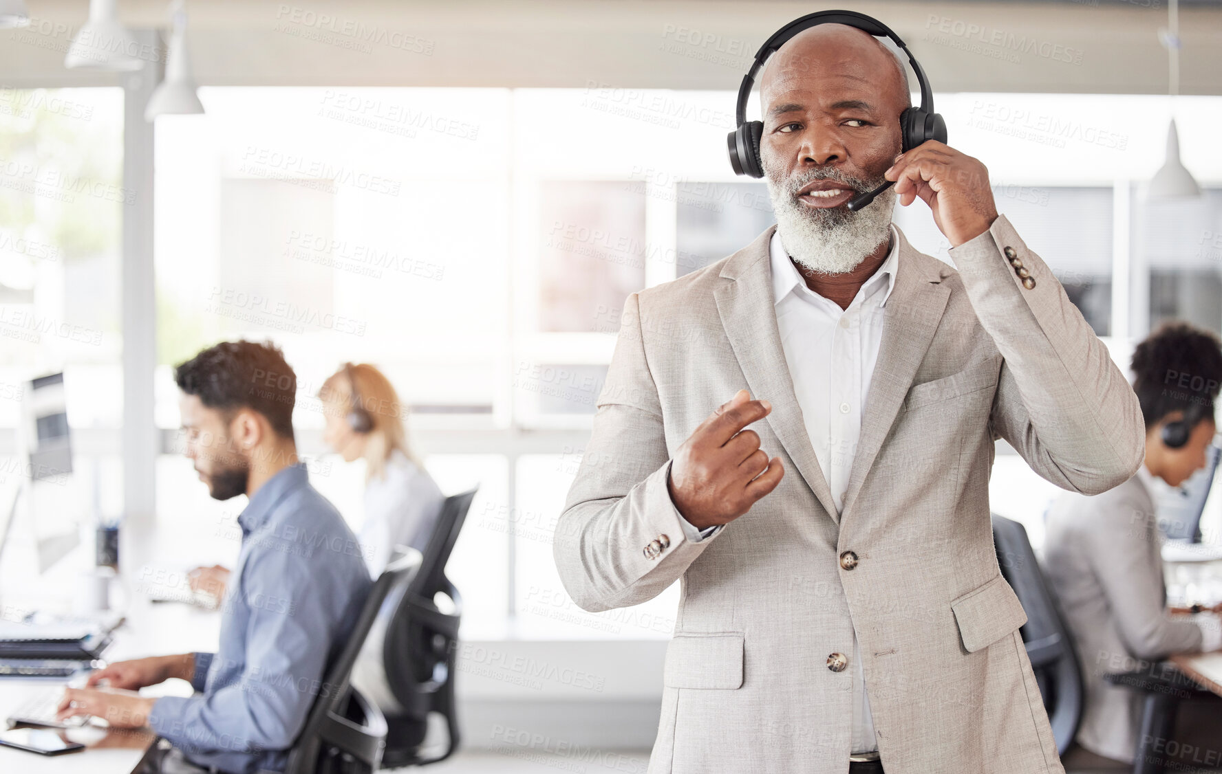 Buy stock photo Black man, call center and consulting manager on headphones for customer service or agent support at office. African American, senior or businessman consultant talking on headset for online advice