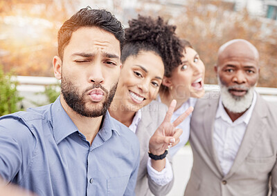 Buy stock photo Business, team and crazy selfie outside with kiss, peace sign and happiness working together with diversity. Success, smile and employees taking outdoor group picture to celebrate achievement or goal