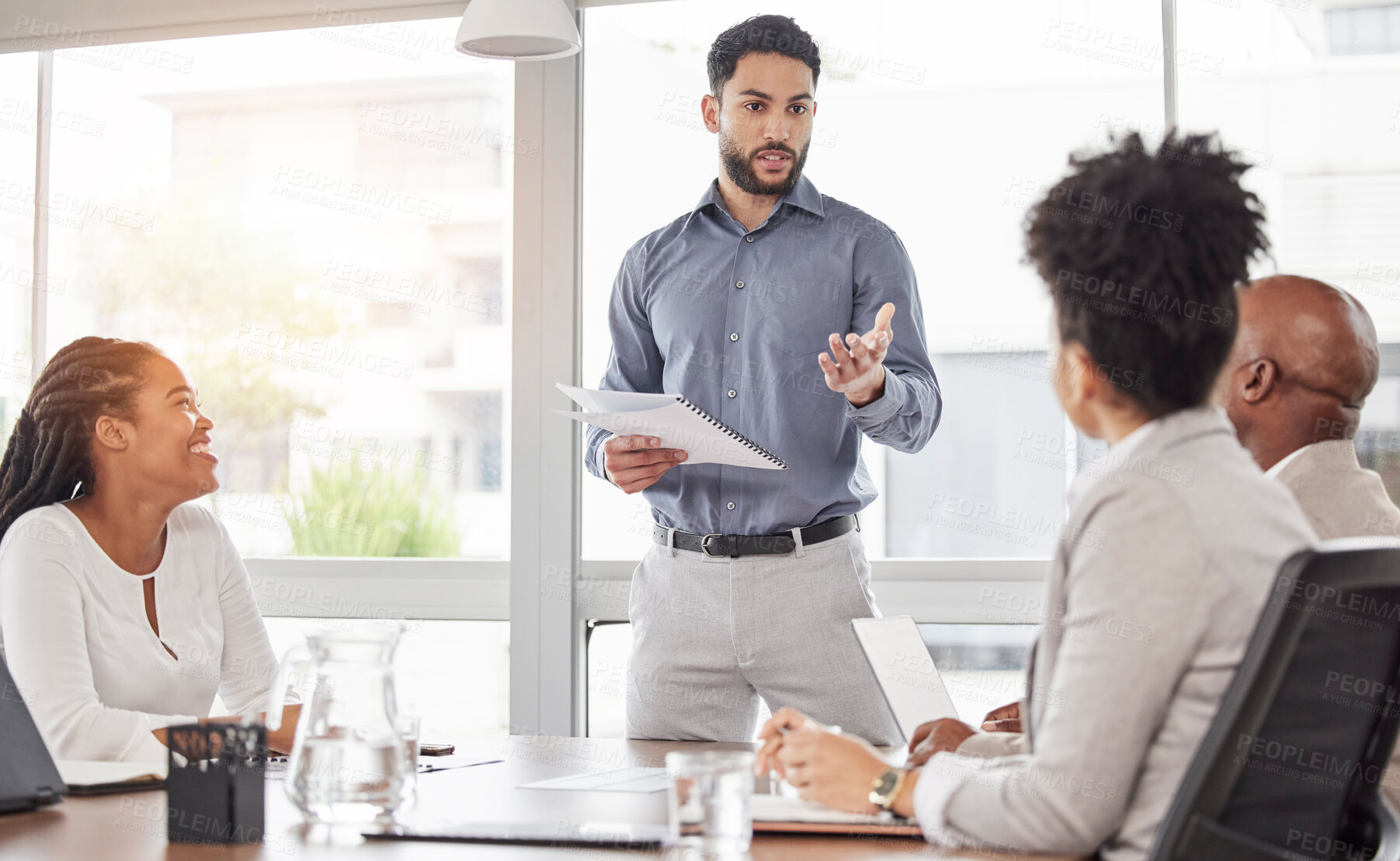 Buy stock photo Meeting, proposal and team workshop, man with ideas at project presentation for growth and development. Success, investment pitch and diversity at work with happy business people in startup office.