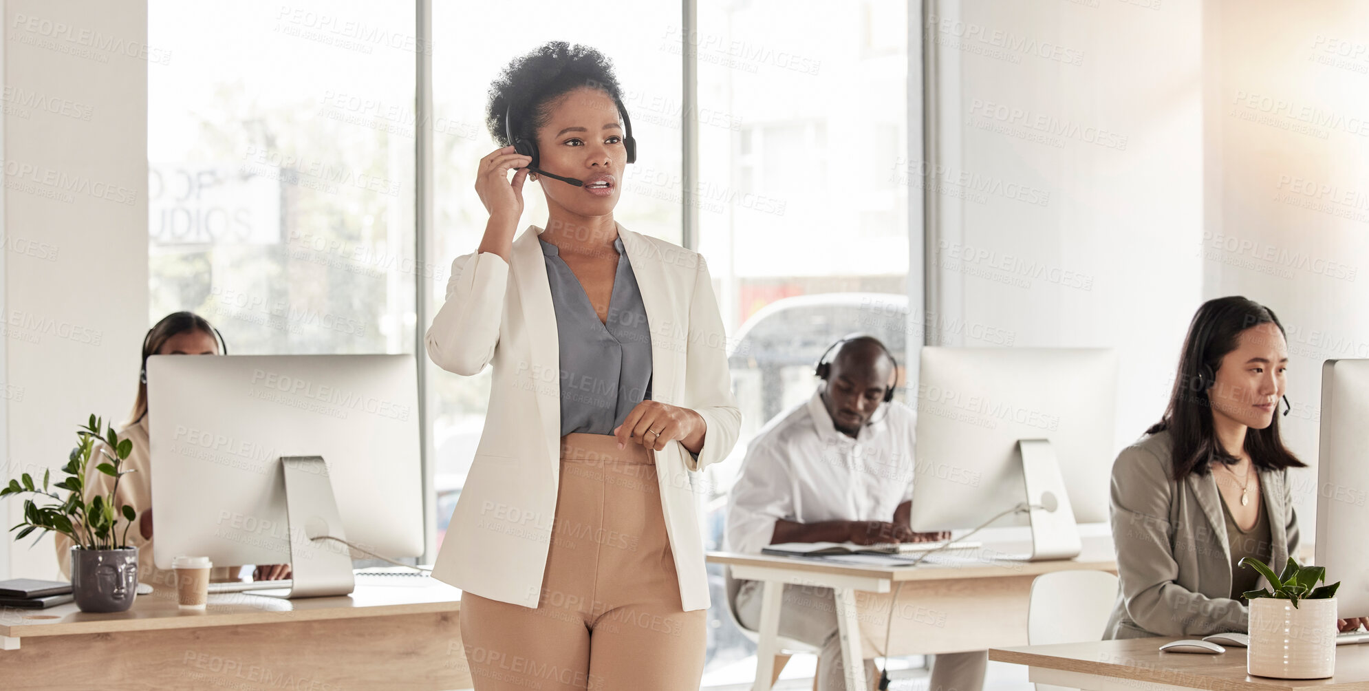 Buy stock photo Call center, manager and black woman in office, sales company and coworking customer service agency. Female telemarketing agent talking on headset for consulting, crm advisory and telecom questions