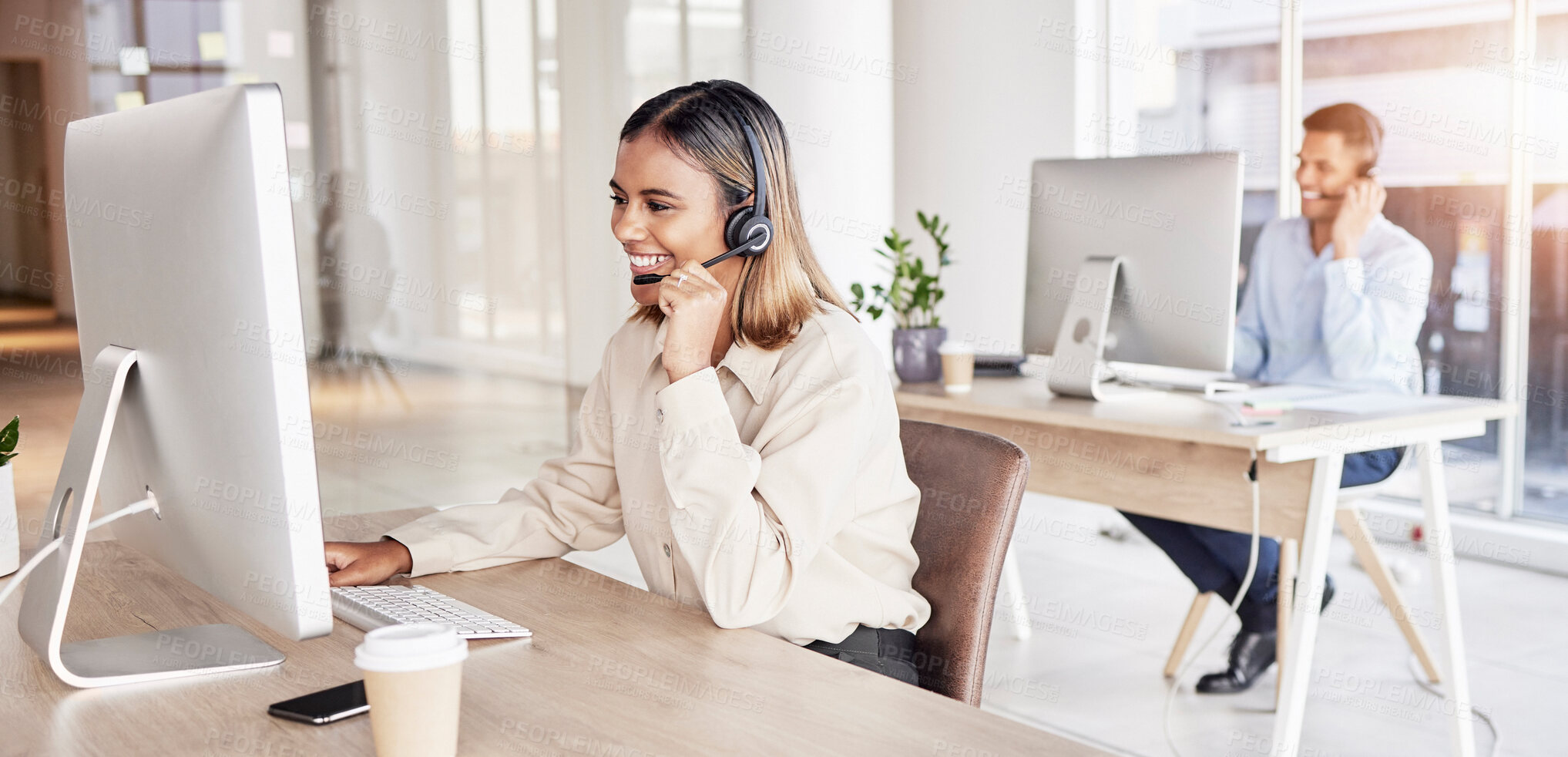 Buy stock photo Call center, business woman and talking at computer in office, coworking sales company and customer service. Happy female telemarketing agent consulting at desktop for advisory questions, crm or help