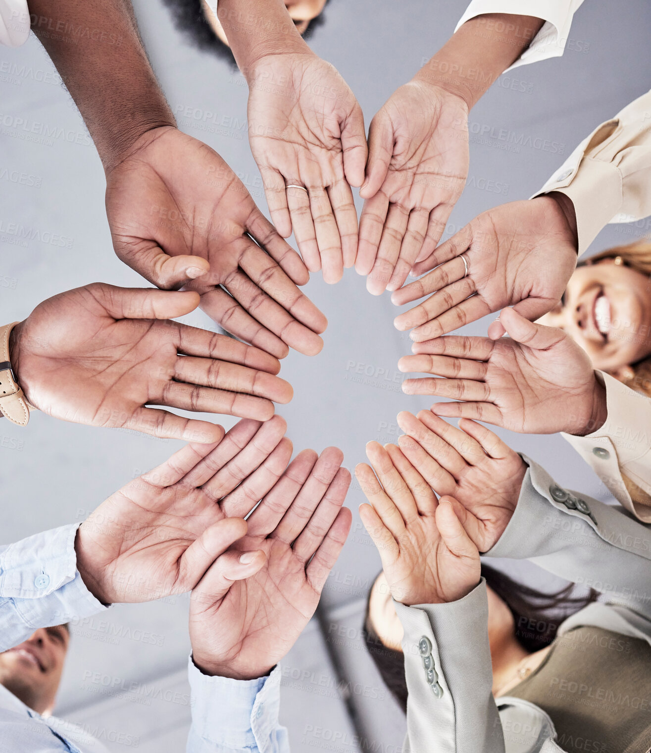 Buy stock photo Hands, circle and together in low angle for business people with teamwork, motivation and solidarity in office. Women, happiness and open palm with smile, team building and support for company goals