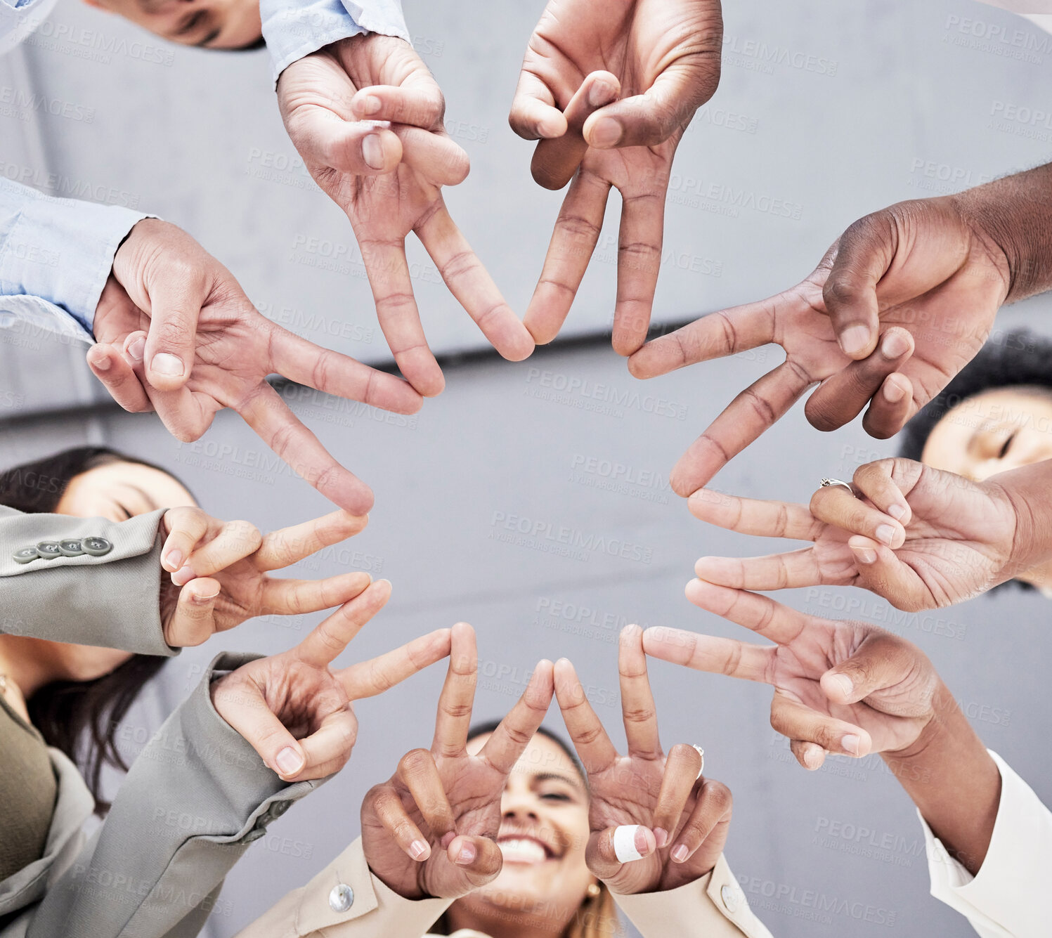 Buy stock photo Hands, star and together in low angle for business people with teamwork, motivation and solidarity in office. Women, happiness and peace sign with shape, team building and support for company goals