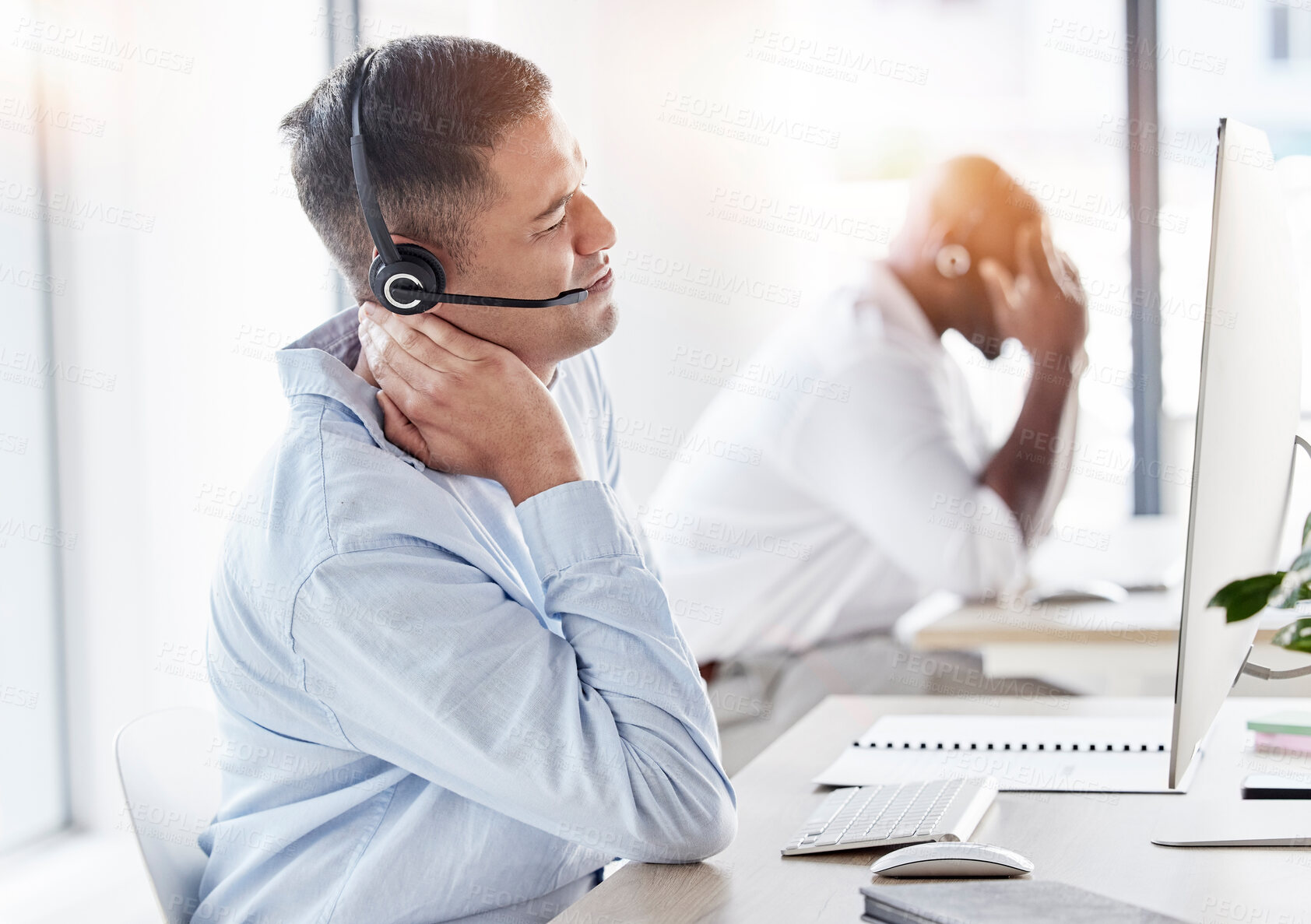 Buy stock photo Neck, pain and stress of man in call center, joint inflammation and tired advisor in business office. Frustrated telemarketing agent, injury and muscle risk of burnout, problem or bad posture at desk