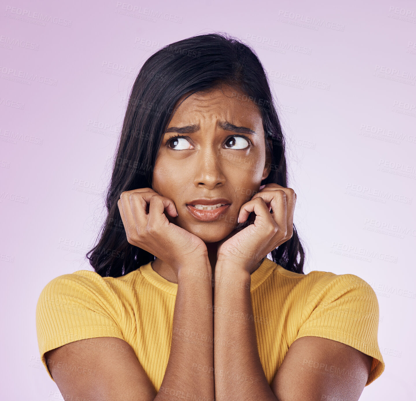 Buy stock photo Scared, worry and face of Indian woman on pink background with fear, nervous and confused expression. Stress, anxiety mockup and isolated female with worried, anxious and crisis reaction in studio