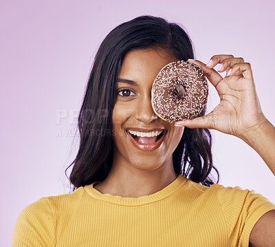 Buy stock photo Donut, cover with portrait of woman in studio for diet, snack and happiness. Sugar, food and smile with female hiding and isolated on pink background for nutrition, playful and craving mockup