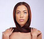 Hair care, woman beauty and portrait in a studio with long and haircut growth from salon styling. Isolated, gray background and young female model with healthy cosmetics and shampoo treatment results