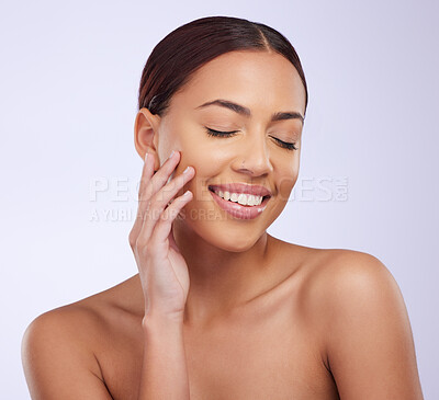 Buy stock photo Woman, clean beauty and skincare in a studio with happiness and smile from dermatology. Skin glow, facial and cosmetics of a young female model feeling happy from  self care and face wellness