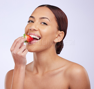 Buy stock photo Woman, skincare and studio portrait with strawberry for self care, diet or beauty with benefits for glow on face. Girl, model and fruit for eating with wellness, health and dermatology by background