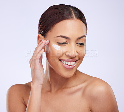 Buy stock photo Skincare, face cream and woman in studio for cosmetic, treatment and dermatology on purple background. Facial, lotion and sunscreen for happy lady model relax with spf, moisturiser or beauty routine